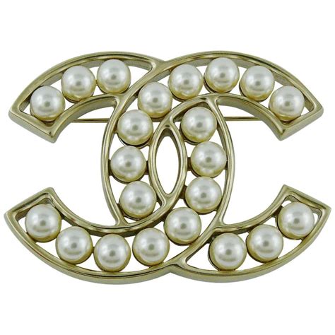 chanel cc brooch price|authentic chanel brooch.